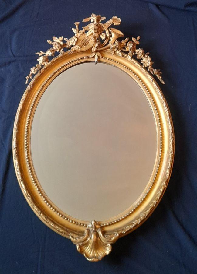 GRAND MIROIR EN BOIS DORE ET STUC NAPOLEON III