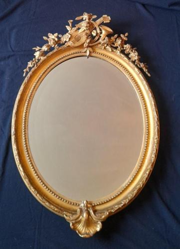 GRAND MIROIR EN BOIS DORE ET STUC NAPOLEON III