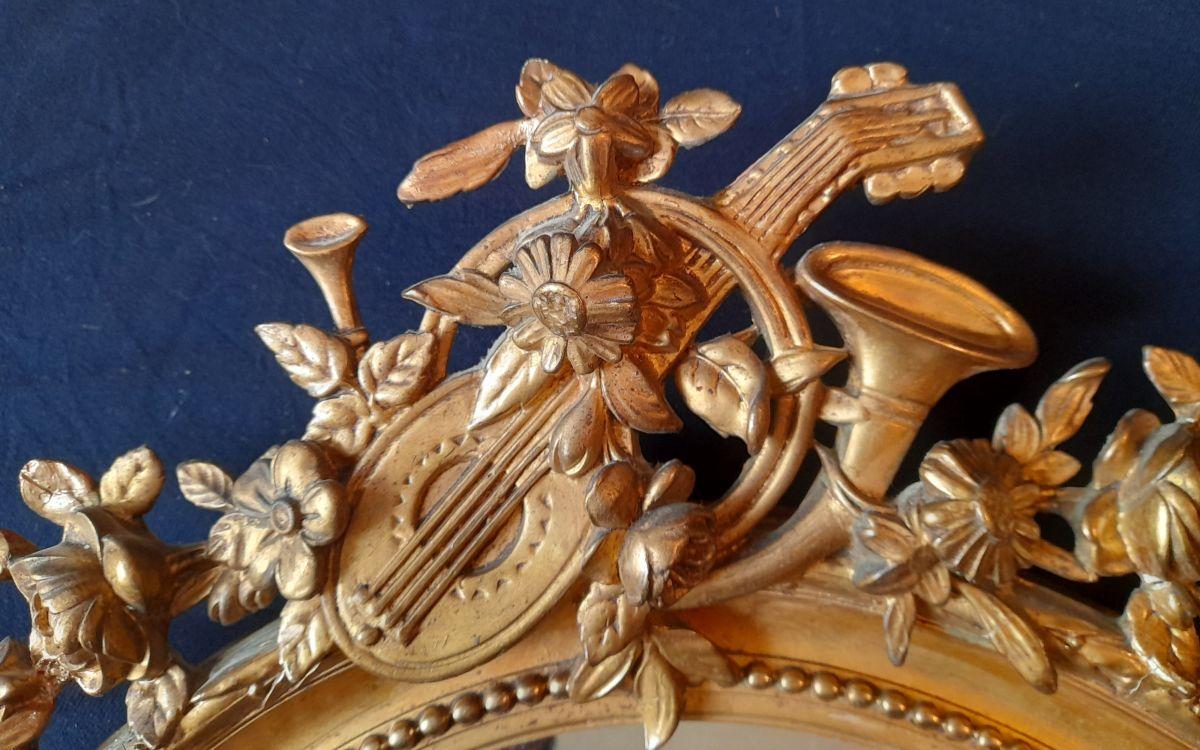 GRAND MIROIR EN BOIS DORE ET STUC NAPOLEON III