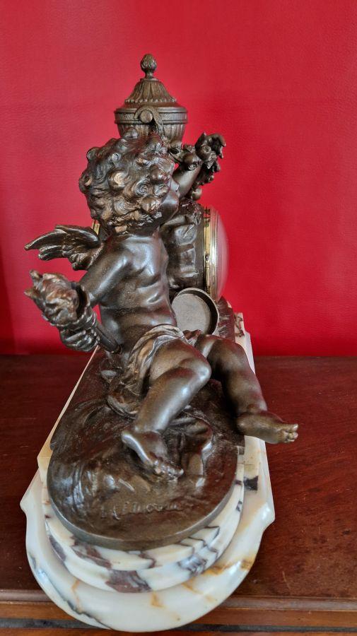 PENDULE ANGE EN REGULE SIGNEE L.F MOREAU